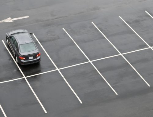 The Most Common Ways Parking Lots Get Damaged Over Time and When You Should Call a Commercial Parking Lot Paving Company